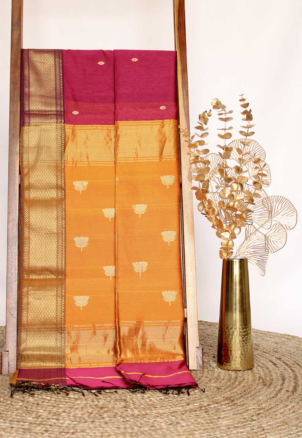 Magenta Maheshwari Saree with lotus weaving on Mustard Pallu & Border