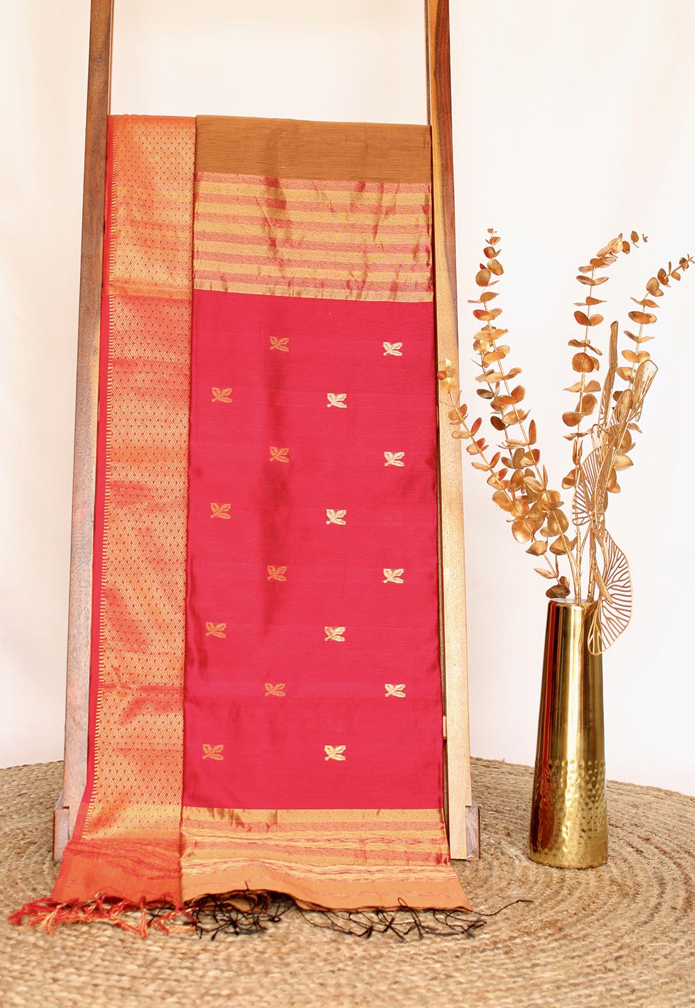 Maroon Maheshwari Saree with floral weaving on Red Pallu & Border